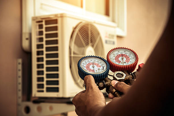 Professional Heat Pump Repair technician working in Logan, IA